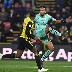 Arsenal's Aubameyang Faces Off Against Watford's Kabasele in Premier League Clash