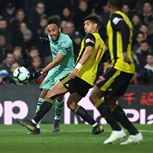 Arsenal's Aubameyang Faces Off Against Watford's Masina in Premier League Clash