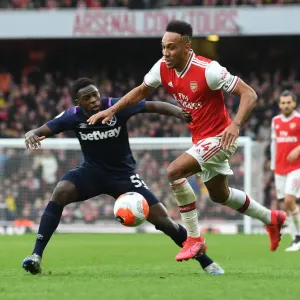Arsenal's Aubameyang Faces Off Against West Ham's Nhakia in Premier League Clash