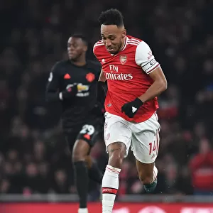 Arsenal's Aubameyang Goes Head-to-Head with Manchester United in Premier League Clash