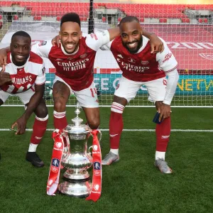 Arsenal's Aubameyang, Lacazette, and Pepe Celebrate FA Cup Victory Amid Empty Wembley Stadium (Arsenal v Chelsea, 2020)