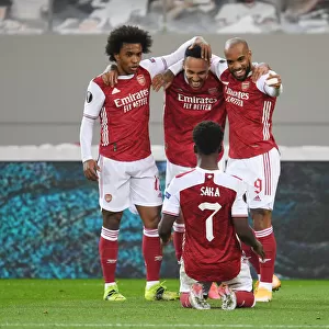 Arsenal's Aubameyang, Lacazette, and Saka Celebrate Goals in Europa League Victory over SL Benfica