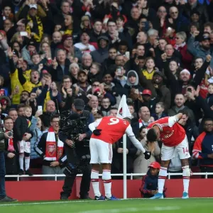 Arsenal's Aubameyang and Lacazette: Celebrating a Goal-Scoring Milestone Against Chelsea in the Premier League Arsenal's Aubameyang and Lacazette: Celebrating a Goal-Scoring Milestone Against Chelsea in the Premier League