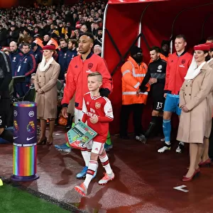Arsenal's Aubameyang Leads Team Out Against Brighton in Premier League Showdown