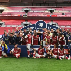 Print of Arsenal's Aubameyang Holding the FA Cup Print of Arsenal's Aubameyang Holding the FA Cup
