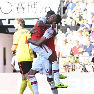 Arsenal's Aubameyang and Maitland-Niles: Celebrating a Victory Over Watford (2019-20)