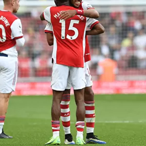 Arsenal's Aubameyang and Maitland-Niles: Victory Celebration Against Norwich City