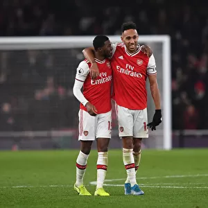 Arsenal's Aubameyang and Maitland-Niles Celebrate Victory Over Manchester United (2019-20)