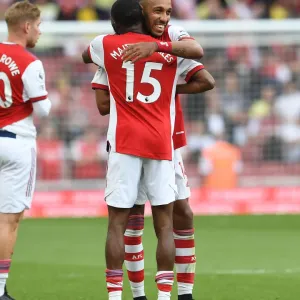Arsenal's Aubameyang and Maitland-Niles: Victory Celebration Against Norwich City Arsenal's Aubameyang and Maitland-Niles: Victory Celebration Against Norwich City