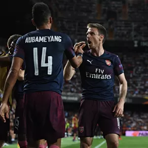 Arsenal's Aubameyang and Monreal Celebrate Goal in Europa League Semi-Final vs Valencia