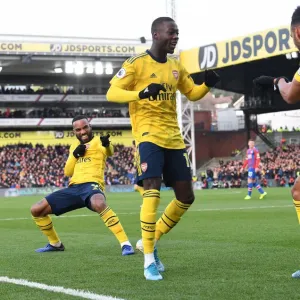 Arsenal's Aubameyang, Pepe, and Lacazette Celebrate Goal Against Crystal Palace (2019-20) Arsenal's Aubameyang, Pepe, and Lacazette Celebrate Goal Against Crystal Palace (2019-20)