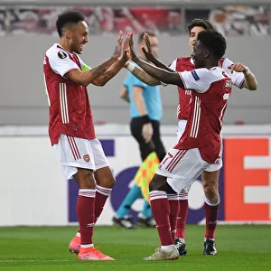 Arsenal's Aubameyang and Saka Celebrate Goal in Europa League Clash vs SL Benfica