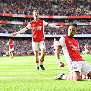 Arsenal's Aubameyang Scores Brace: Thrilling 2-1 Victory Over Tottenham in the Premier League (2021-22)