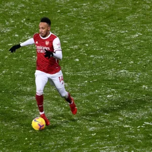 Arsenal's Aubameyang Scores the Difference: Arsenal Triumph Over West Bromwich Albion in Intense Premier League Clash (2020-21)