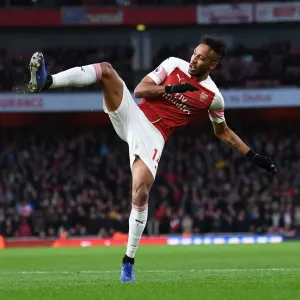 Arsenal's Aubameyang Shines in Premier League Clash Against Huddersfield Arsenal's Aubameyang Shines in Premier League Clash Against Huddersfield