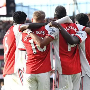 Arsenal's Aubameyang, Smith Rowe, and Saka Celebrate Goals Against Tottenham in 2021-22 Premier League
