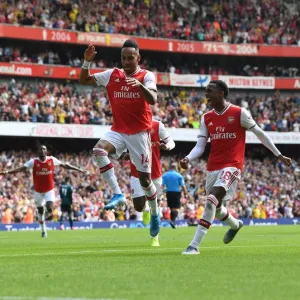 Arsenal's Aubameyang and Willock: Celebrating Goals Against Burnley (2019-20) Arsenal's Aubameyang and Willock: Celebrating Goals Against Burnley (2019-20)
