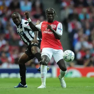 Arsenal's Bacary Sagna Tackles Udinese's Pablo Armero in 2011-12 UEFA Champions League Play-Off