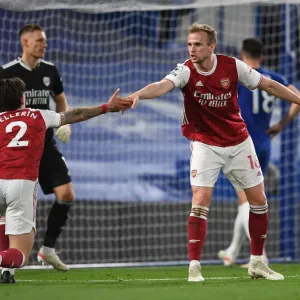 Arsenal's Bellerin and Holding Share a Moment Amidst Empty Stamford Bridge: Chelsea vs. Arsenal, 2021-22 Premier League Arsenal's Bellerin and Holding Share a Moment Amidst Empty Stamford Bridge: Chelsea vs. Arsenal, 2021-22 Premier League