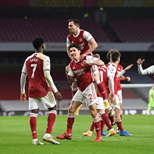 Arsenal's Bellerin, Saka, and Cedric: Celebrating a Triumphant Three-Goal Spree Against Leeds United in the Premier League, 2021