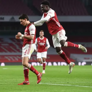 Arsenal's Bellerin and Saka Celebrate Third Goal Against Leeds United in 2020-21 Premier League Arsenal's Bellerin and Saka Celebrate Third Goal Against Leeds United in 2020-21 Premier League