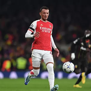 Arsenal's Ben White in Action: Arsenal vs. RC Lens, 2023-24 UEFA Champions League