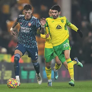 Arsenal's Ben White Faces Off Against Norwich's Pierre Lees-Melou in Premier League Clash