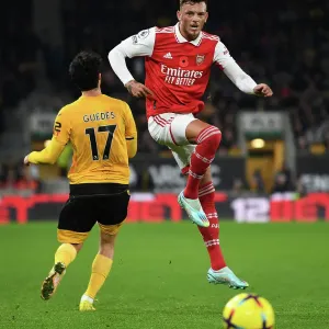 Arsenal's Ben White Fends Off Wolves Goncalo Guedes Pressure in Premier League Clash (Wolverhampton Wanderers vs Arsenal 2022-23)