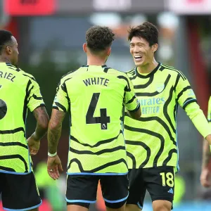 Arsenal's Ben White and Takehiro Tomiyasu Celebrate Fourth Goal Against AFC Bournemouth (2023-24) Arsenal's Ben White and Takehiro Tomiyasu Celebrate Fourth Goal Against AFC Bournemouth (2023-24)