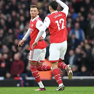 Arsenal's Ben White and William Saliba Celebrate Goals Against AFC Bournemouth in Premier League Clash (2022-23)