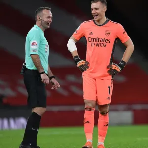 Arsenal's Bernd Leno Shares a Light-Hearted Moment with Referee Paul Tierney During Arsenal v Southampton Match, Premier League 2020-21