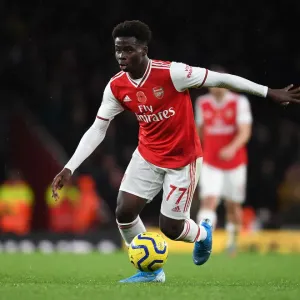 Arsenal's Bukayo Saka in Action: Arsenal vs. Wolverhampton Wanderers (2019-2020) Arsenal's Bukayo Saka in Action: Arsenal vs. Wolverhampton Wanderers (2019-2020)