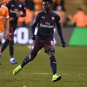 Arsenal's Bukayo Saka in Action against Blackpool in FA Cup Third Round