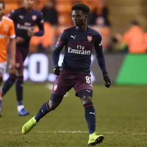 Arsenal's Bukayo Saka in Action against Blackpool in FA Cup Third Round