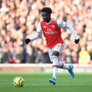 Arsenal's Bukayo Saka in Action Against Chelsea in the Premier League Arsenal's Bukayo Saka in Action Against Chelsea in the Premier League