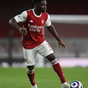 Arsenal's Bukayo Saka in Action against Everton during the 2020-21 Premier League Match Arsenal's Bukayo Saka in Action against Everton during the 2020-21 Premier League Match