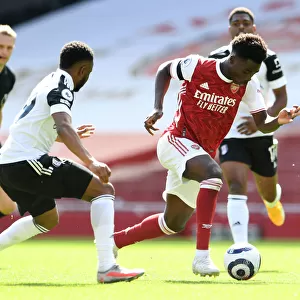 Arsenal's Bukayo Saka in Action against Fulham during Empty Emirates Stadium, Premier League 2020-21