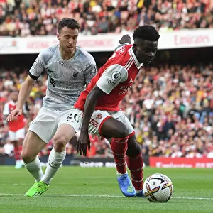 Arsenal's Bukayo Saka in Action Against Liverpool in the 2022-23 Premier League