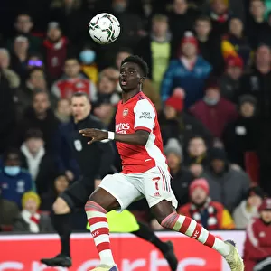 Arsenal's Bukayo Saka in Action against Liverpool in Carabao Cup Semi-Final