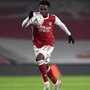 Arsenal's Bukayo Saka in Action against Newcastle United - FA Cup Third Round