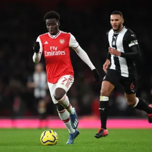 Arsenal's Bukayo Saka in Action against Newcastle United - Premier League 2019-2020 Arsenal's Bukayo Saka in Action against Newcastle United - Premier League 2019-2020