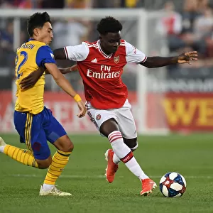 Arsenal's Bukayo Saka in Action: Pre-Season Clash Against Colorado Rapids (2019-20)