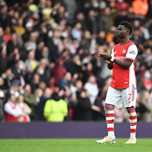 Arsenal's Bukayo Saka Celebrates with Fans After Hard-Fought Arsenal v Manchester City Match, Premier League 2021-22