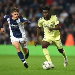 Print of Bukayo Saka in Carabao Cup Action Print of Bukayo Saka in Carabao Cup Action