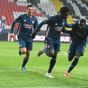 Arsenal's Bukayo Saka, Dani Ceballos, and Nicolas Pepe Celebrate Goals in Empty Eden Arena during Slavia Prague vs Arsenal UEFA Europa League Quarterfinal Arsenal's Bukayo Saka, Dani Ceballos, and Nicolas Pepe Celebrate Goals in Empty Eden Arena during Slavia Prague vs Arsenal UEFA Europa League Quarterfinal