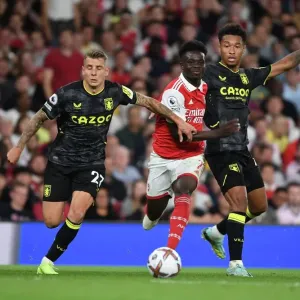 Arsenal's Bukayo Saka Faces Off Against Aston Villa's Lucas Digne and Boubacar Bernard Kamara in 2022-23 Premier League Clash Arsenal's Bukayo Saka Faces Off Against Aston Villa's Lucas Digne and Boubacar Bernard Kamara in 2022-23 Premier League Clash