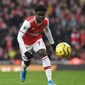 Arsenal's Bukayo Saka Faces Off Against Chelsea at the Emirates Stadium