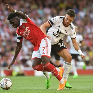 Arsenal's Bukayo Saka Faces Off Against Fulham's Joao Palhinha in Premier League Clash