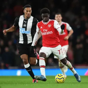 Arsenal's Bukayo Saka Faces Off Against Newcastle's Isaac Hayden in Premier League Clash Arsenal's Bukayo Saka Faces Off Against Newcastle's Isaac Hayden in Premier League Clash