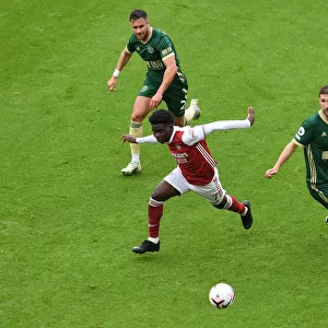 Arsenal's Bukayo Saka Faces Off Against Sheffield United Defenders